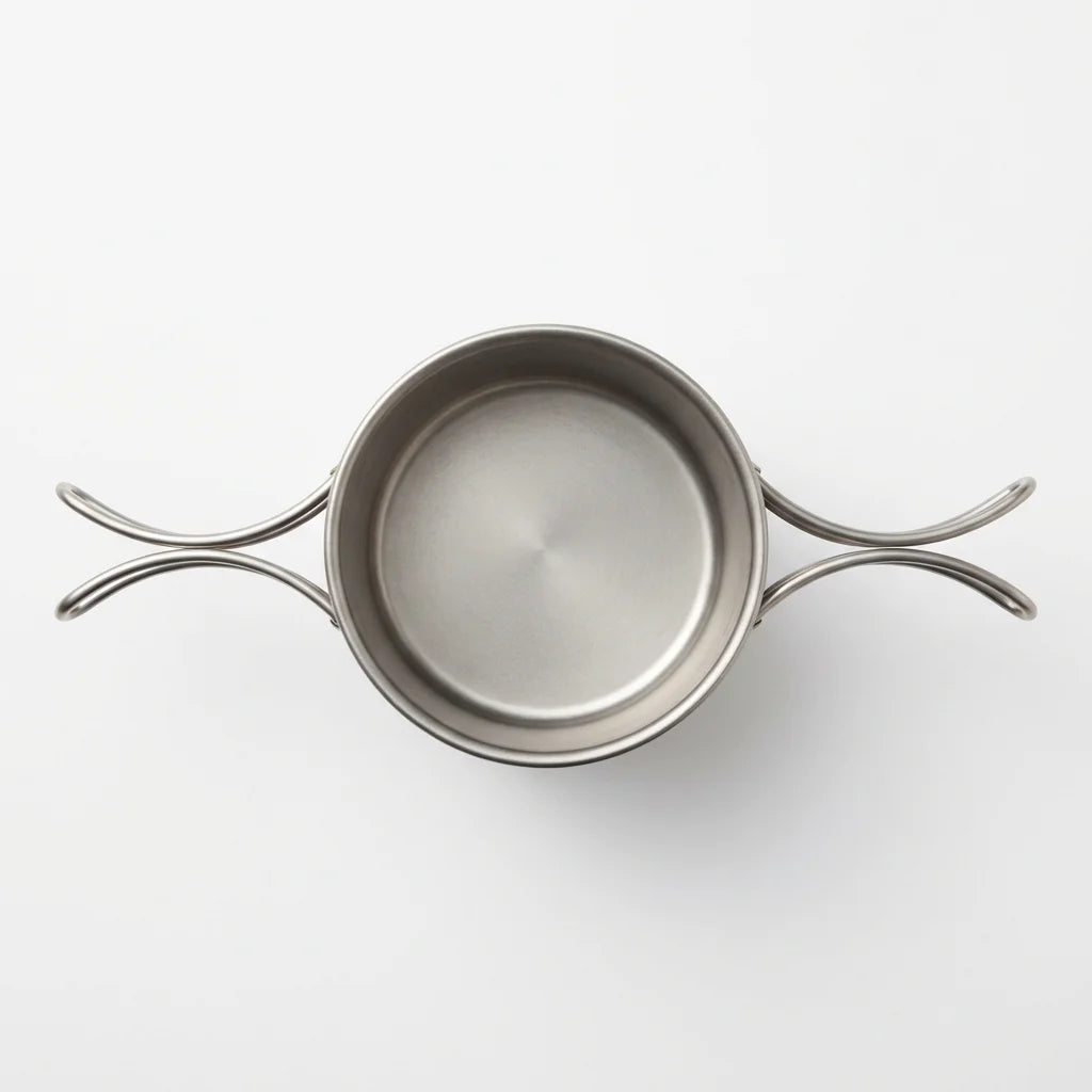 Top-down flat lay showing wide mouth opening and foldable handles